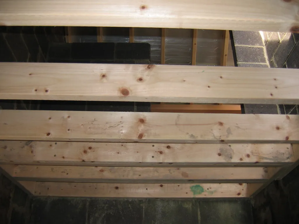 Wooden floor joists seen from below